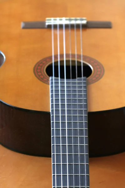 stock image Music instrument guitar on table