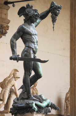 Perseus holding the head of Medusa clipart