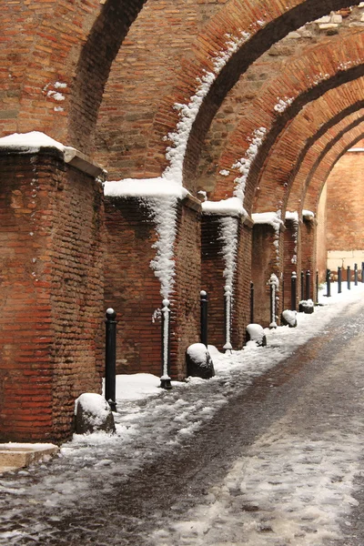 stock image Romanic style archway in wintertime