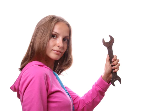 Woman with wrench, isolated — Stock Photo, Image