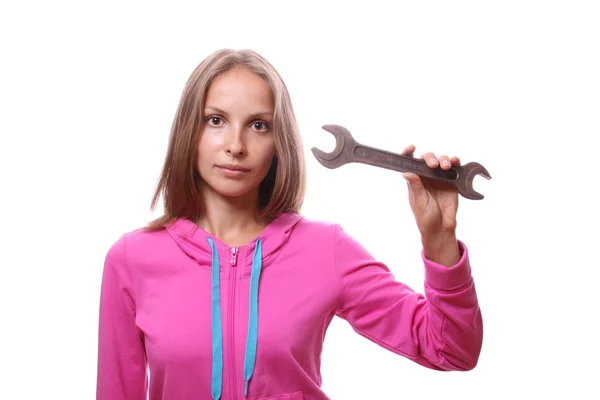 Vrouw met moersleutel, geïsoleerd — Stockfoto
