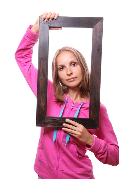 Женщина держит пустую рамку — стоковое фото