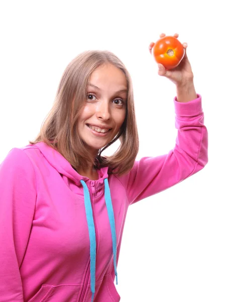Donna con un pomodoro, isolata — Foto Stock