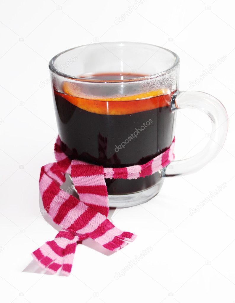 Cup of winter drink wrapped in scarf