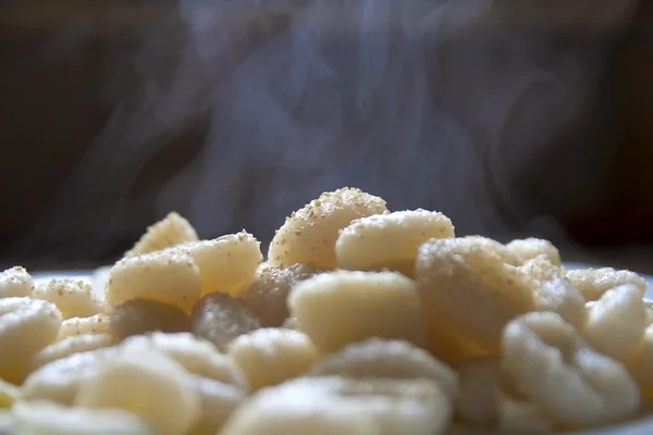 Fresh cooked steaming gnocchi — Stock Photo, Image