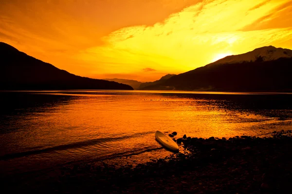 Sörf ve günbatımı — Stok fotoğraf
