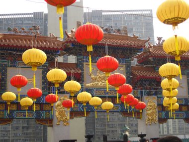 Chinese Paper Lanterns in front of a temple clipart