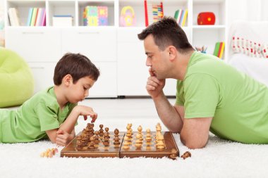 Playing chess with dad clipart