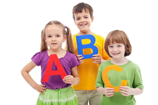 Crianças com letras abc — Fotografia de Stock