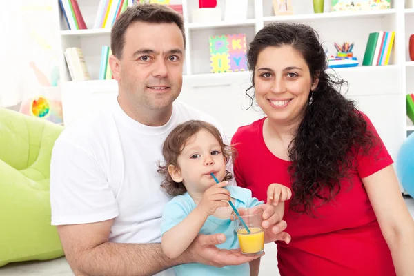 Young family with a child — Stock Photo, Image