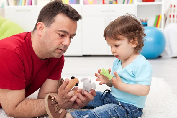 Father and toddler son playing — Stock Photo, Image