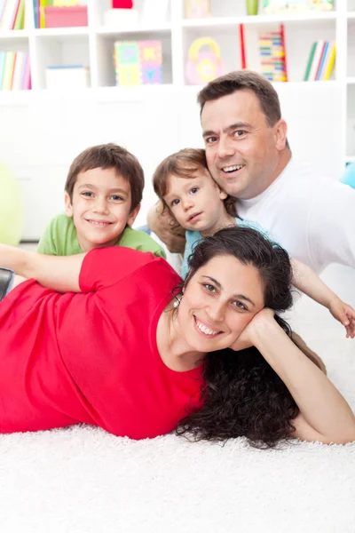 Young family portrait in their home — Stock Photo, Image