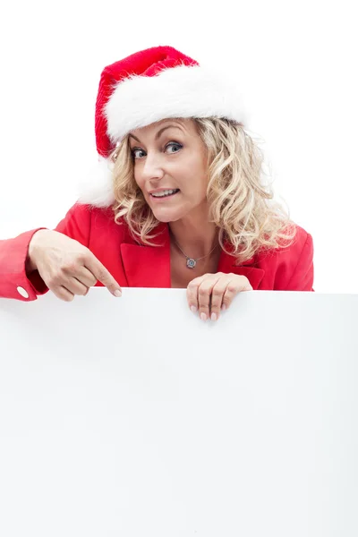 Christmas woman showing interesting holidays offer — Stock Photo, Image