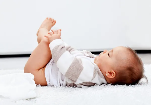 Baby girl waiting for a new diaper — Stock Photo, Image