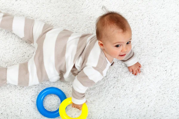Young baby girl on the floor — Stock Photo, Image