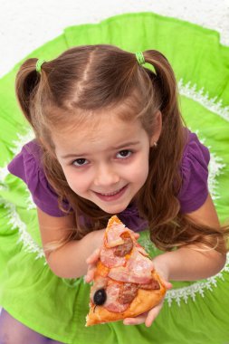 Little girl eating pizza clipart