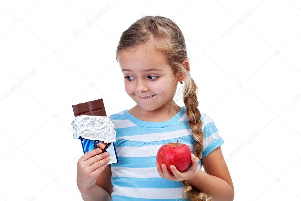 Diet choices - little girl with apple and chocolate