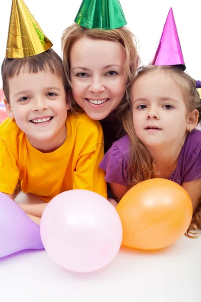 Party with hats and balloons — Stock Photo, Image