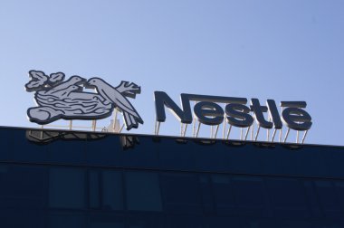 The headquarters of Nestle chocolate factory in the capital city of Prague  clipart
