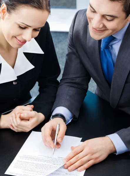 Businesspeople with documents at office — Stock Photo, Image