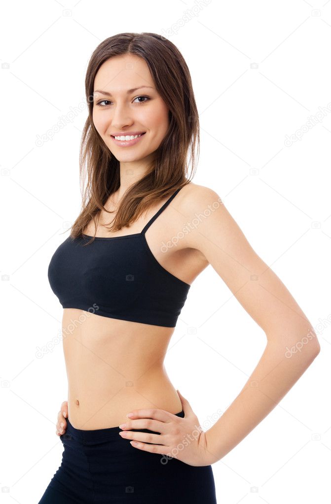 Smiling woman in fitness wear, isolated