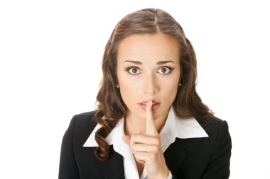 Businesswoman keeping finger on her lips, on white clipart