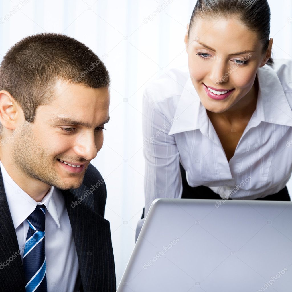 Two business working with laptop