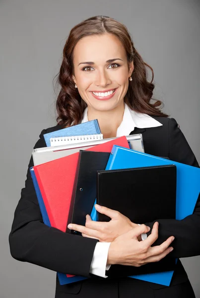 Geschäftsfrau mit Mappen, grau — Stockfoto