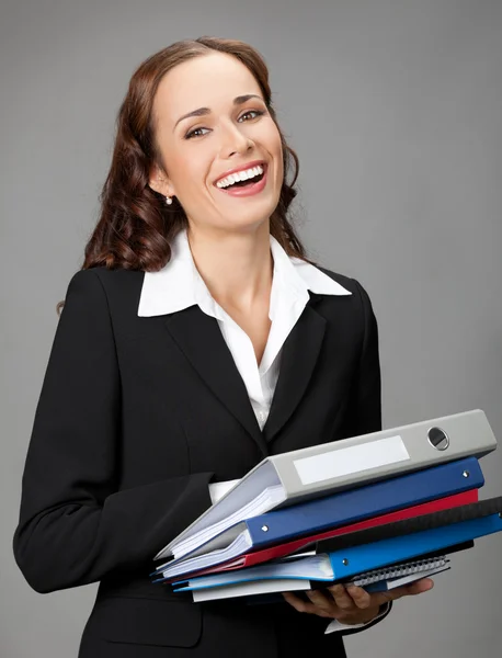 Geschäftsfrau mit Mappen, grau — Stockfoto