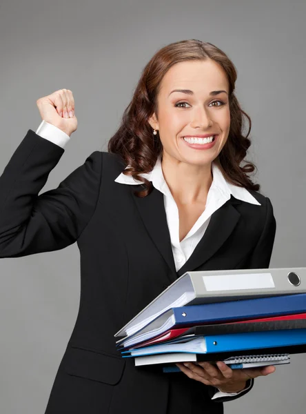 Businesswoman with folders, on gray — Stock Photo, Image