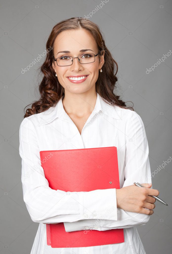 Businesswoman with folder, on gray