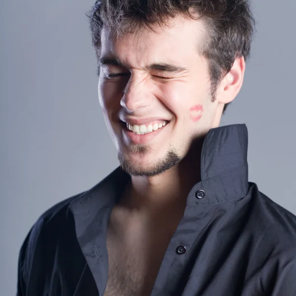 Young man with lipstick kiss — Stock Photo, Image