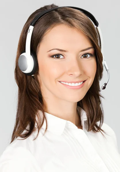 Support telefoon operator in hoofdtelefoon, op grijs — Stockfoto