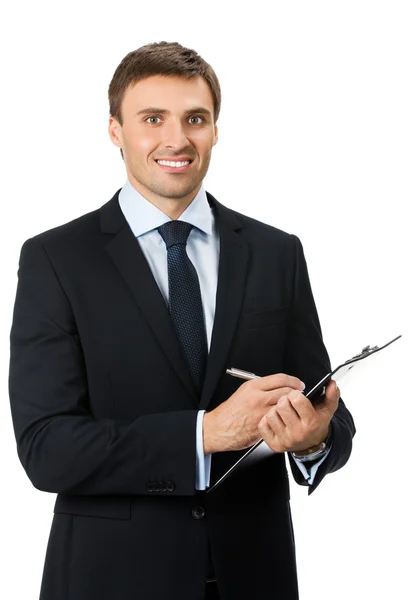 Businessman with clipboard writing, isolated — Stock Photo, Image