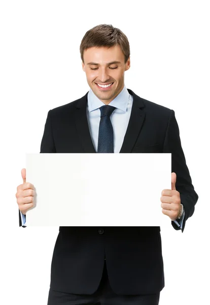 Uomo d'affari che mostra cartello bianco, isolato — Foto Stock