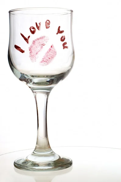 Glas med meddelande och kyss — Stockfoto