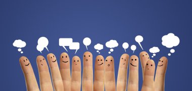 Happy group of finger smileys with social chat sign and speech bubbles. clipart