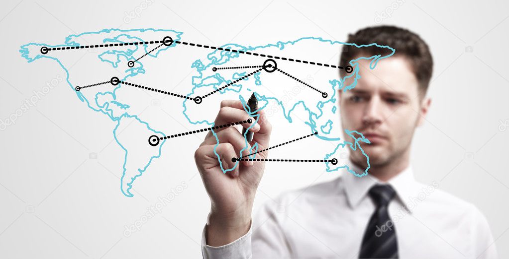 Young business man drawing a global network or globalization concept on world map.
