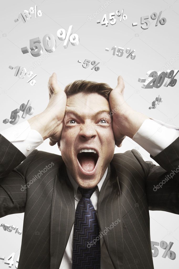 Man shouting loud under falling percents signs above his head