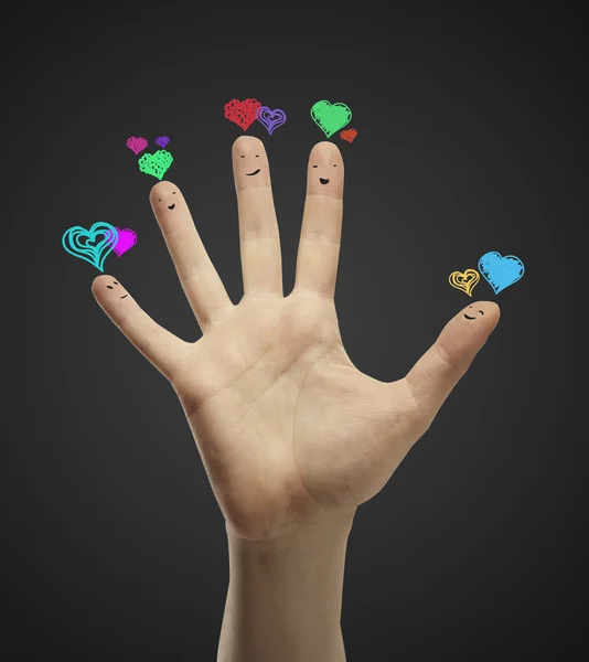 Group of happy finger smileys with love heart speech bubbles — Stock Photo, Image