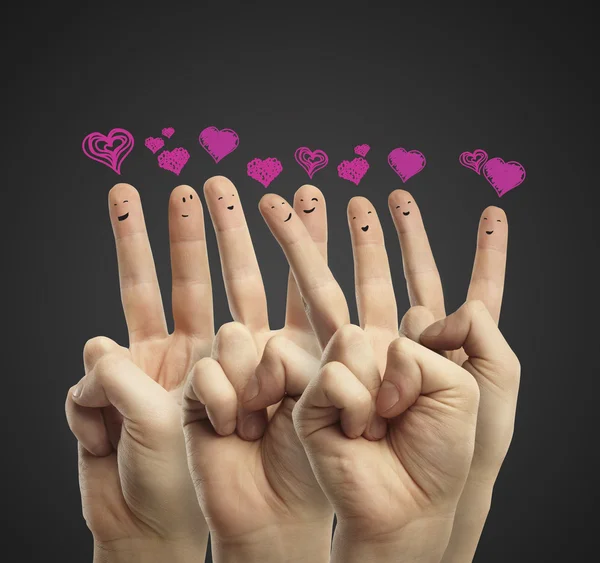 Ομάδα ευτυχισμένος δάχτυλο φατσούλες με αγάπη καρδιά Συννεφάκια ομιλίας — Φωτογραφία Αρχείου