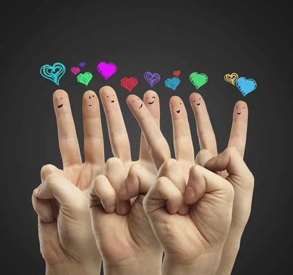 Grupo de sorrisos de dedo felizes com bolhas de discurso de coração de amor — Fotografia de Stock