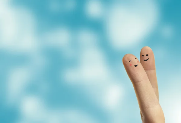 Paar knuffel van gelukkig vingers smileys met liefde. — Stockfoto
