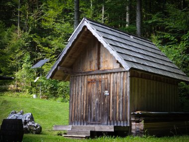 Old house with solar array clipart