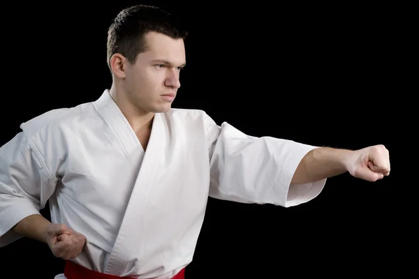 Contraste karate joven luchador en negro — Foto de Stock