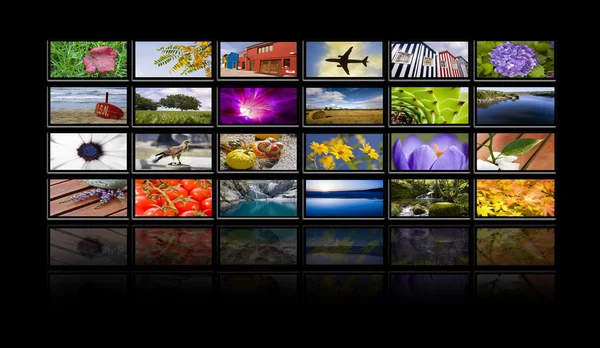 Stock image Tv screens with reflections on black background