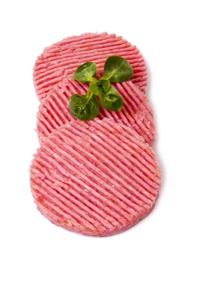 Carne de hambúrguer isolada sobre fundo branco — Fotografia de Stock