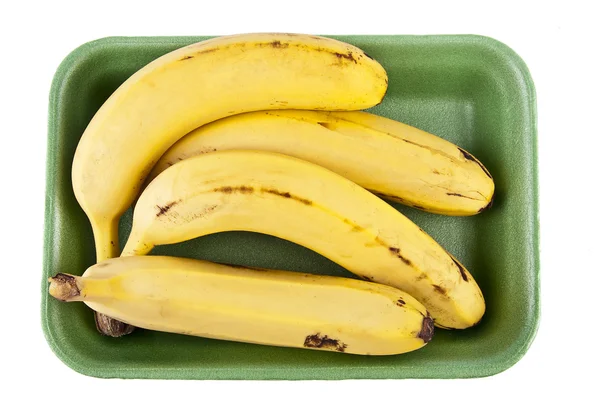 Plátanos en la sartén con fondo blanco — Foto de Stock