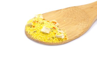 Spices on a wood spoon