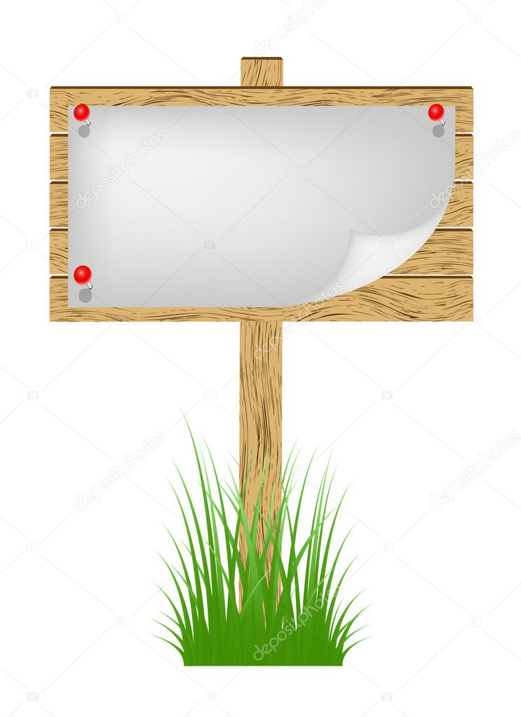 Wooden billboard with white sheet of paper standing in a grass